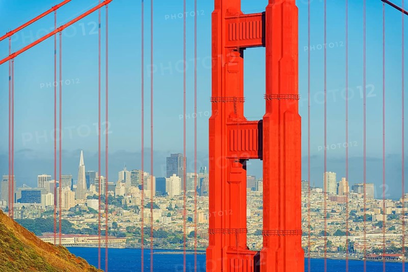View of Golden Gate Bridge and financial district in the distance, San Francisco, California, USA
