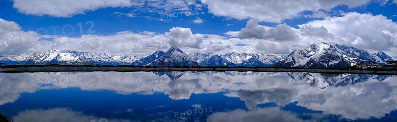 Mountain lake with alpine panorama, snow pond Finkenberg, Penken, Mayrhofen, Zillertal, Tyrol, Austria