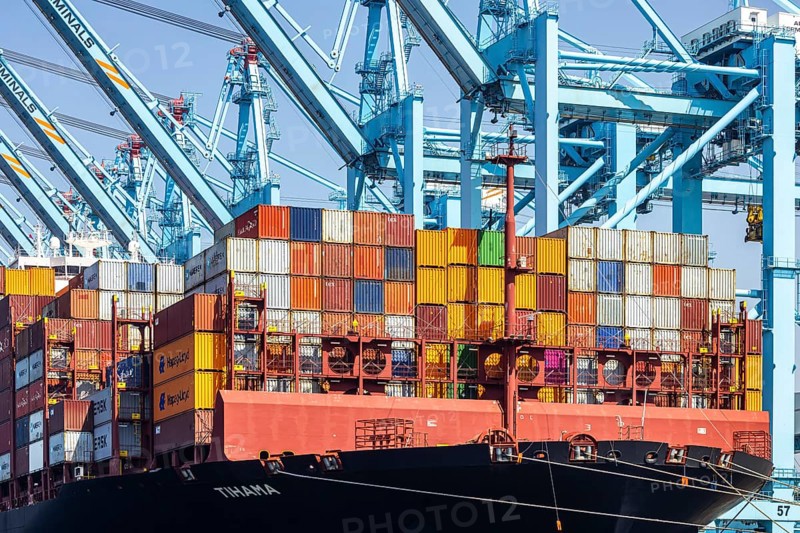 Container ship Tihama from Hapag Lloyd. With a length of 400 metres, the ULCV is one of the largest container ships in the world. APM Container Terminal. Maasvlakte 2 deep-sea port on artificial land // 01.05.2025. Rotterdam, Zuid-Holland, Netherlands