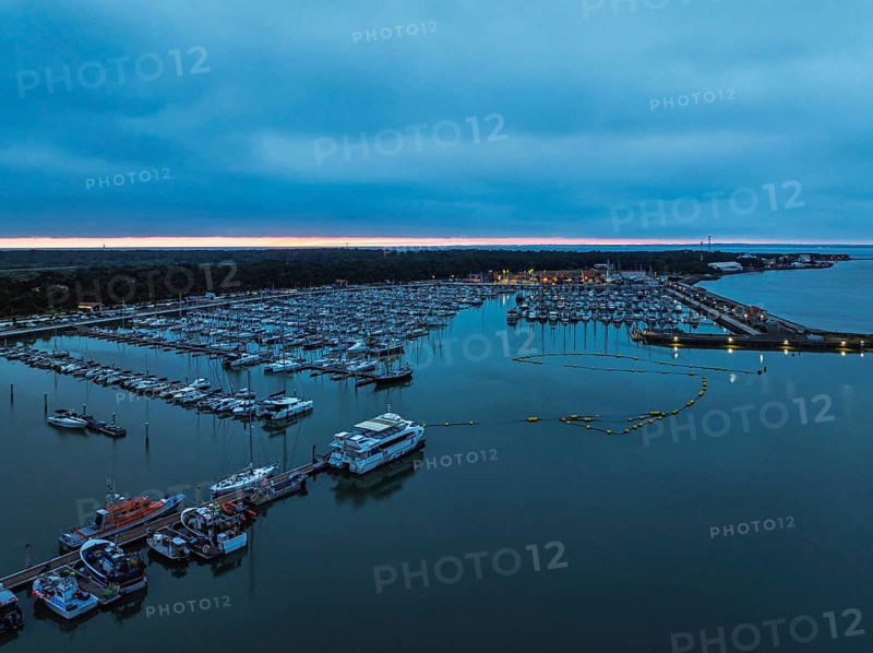 Sunset over Marina in Le Verdon-sur-Mer from a drone, Nouvelle-Aquitaine, Gironde, France, EuropeLe Verdon-sur-Mer, Nouvelle-Aquitaine, Gironde, France, Europe