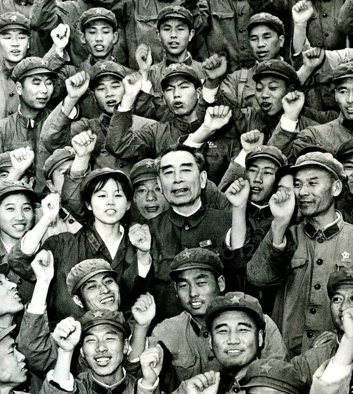 Zhou Enlai, also known as Tschu En Lai or Tschou En-lai, Prime Minister of the People's Republic of China, with communist workers, fist as symbol, ca, 1970s