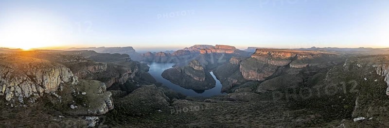 Sunset at Blyde River Canyon with Three Rondawels peak, view of canyon with Blyde River and table mountains in the evening light, canyon landscape, Panorama Route, Mpumalanga, South Africa