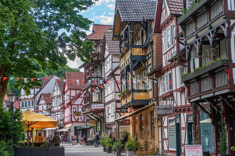 Half-timbered idyll of the old town of Bad Sooden, Allendorf, Bad Sooden district, townscape, restored gabled half-timbered houses with balconies, pedestrian zone for strolling, shops, sunshades, restaurants, Werra-Meissner district, Hesse, Germany