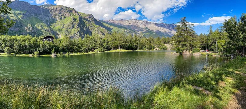View of small picturesque romantic mountain lake Lago Grande near Moncenisio in Val Cenischia in Graian Alps, Moncenisio, Piedmont, Italy
