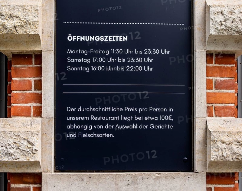 Sign at the entrance to a restaurant on Hausvogteiplatz, Berlin, Germany