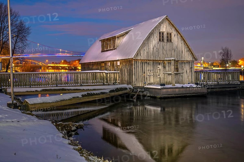 Schiffmühle illuminated winter snow ice Minden Germany