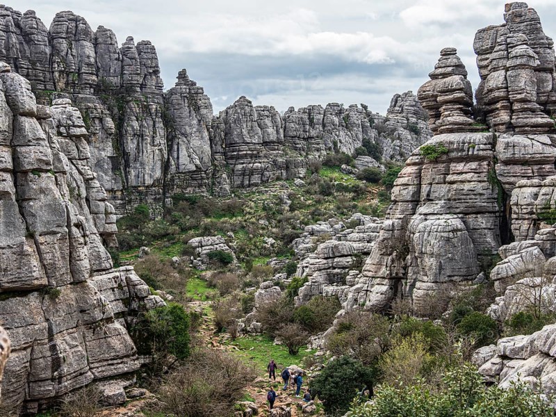 Hikers in the El Torcal de Antequera mountain range, hiking path, rock formations, Andalusia, Spain