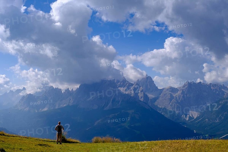 Mountaineer on the helmet, view of the Sesto sundial, Sesto, Dolomites, Val Pusteria, South Tyrol, Italy
