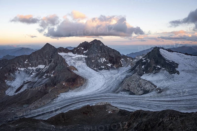 High mountain landscape at sunset, glacier and rocky mountain peaks, view of the Königshofspitz mountain peak and Übeltalferner glacier, Stubai Alps, South Tyrol, Italy