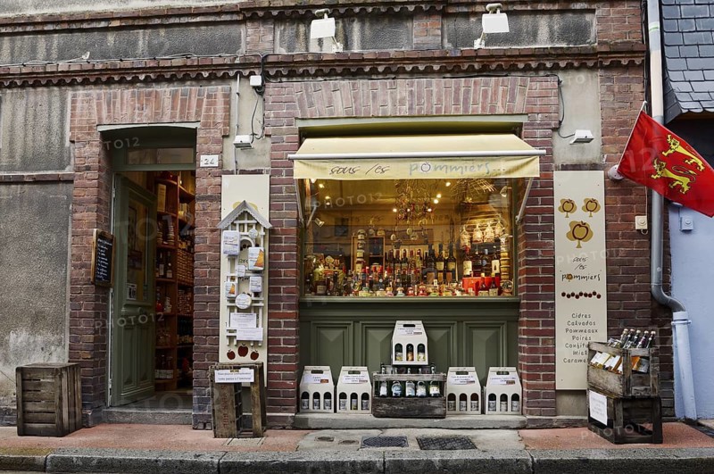Entrance and shop window of a Calvados and cider shop, Vieux Bassin, Honfleur, Cote Fleurie, Pays d'Auge, Département Calvados, Normandy, France