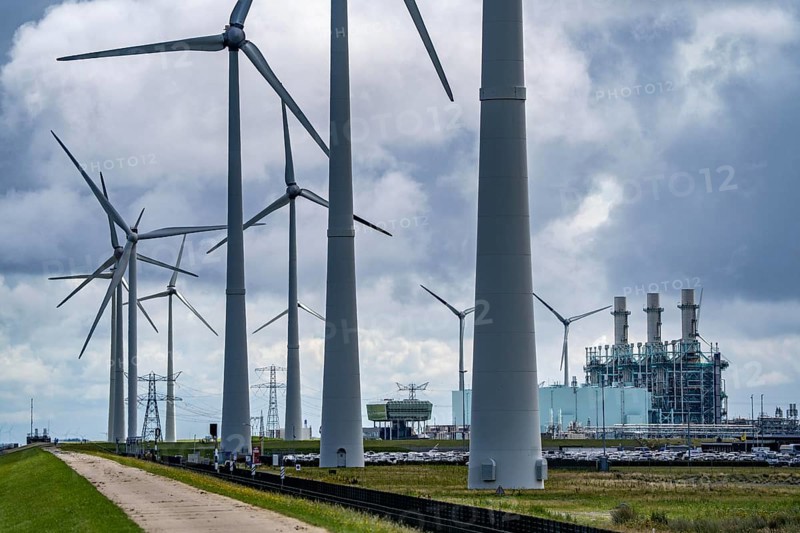 Magnum gas-fired power plant, with a capacity of 1410 megawatts, in the seaport of Eemshaven, operator RWE Power, wind farm, Netherlands