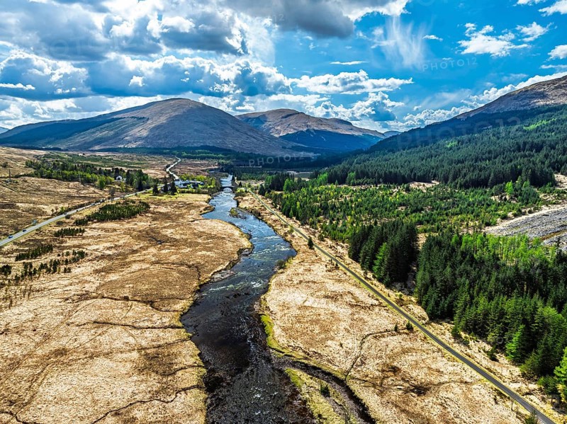 Mountains and Moors over Loch Tulla and River Orchy from a drone, Highlands, Scotland, UK