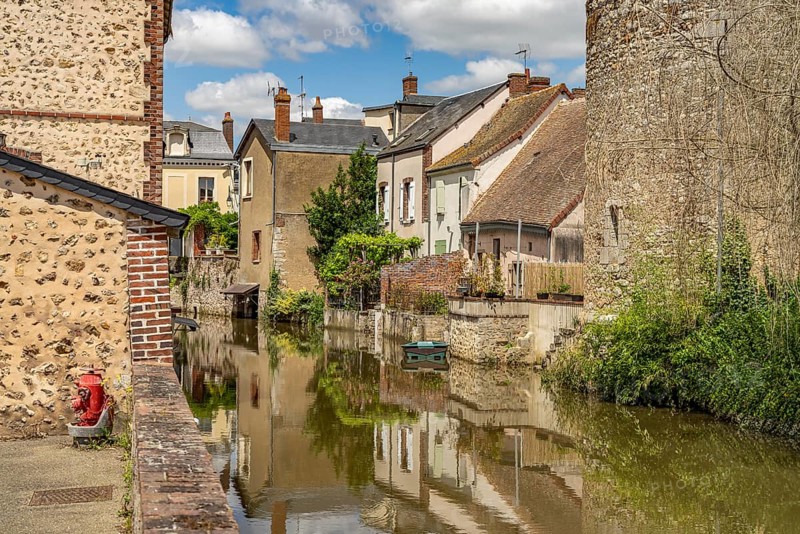 Moat in the old town of Bonneval, Centre-Val de Loire, France