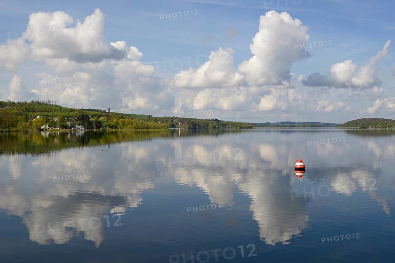 View over the Möhnesee, Möhnesee tower, red and white buoy, blue cloudy sky, reflection on the water surface, Möhnetalsperre, North Rhine-Westphalia, Germany