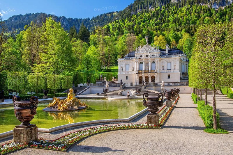 Water parterre with flora fountain and the portal of Linderhof Castle in spring, municipality of Ettal, Ammergau Alps, Ammertal, Upper Bavaria, Bavaria, Germany