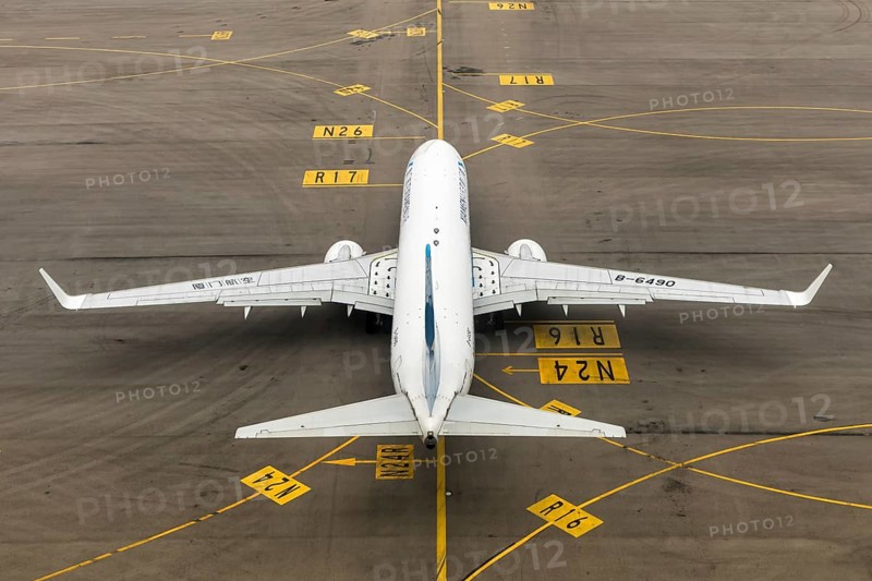 A Boeing 737-800 aircraft of Xiamenair with registration number B-6490 at Chek Lap Kok Airport (HKG) in Hong Kong, China