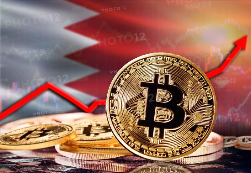 Bitcoin with Bahrain flag in the background. Investors in cryptocurrency and Blockchain Technology in Bahrain, Concept