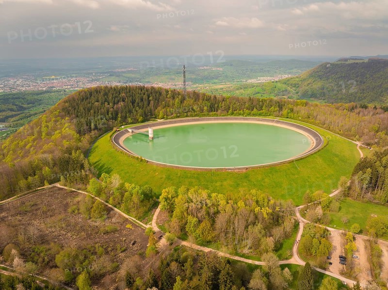 Upper reservoir, landscape with reservoir and forest on a hill, observation tower in the background, Glems reservoir, Swabian Alb, Germany