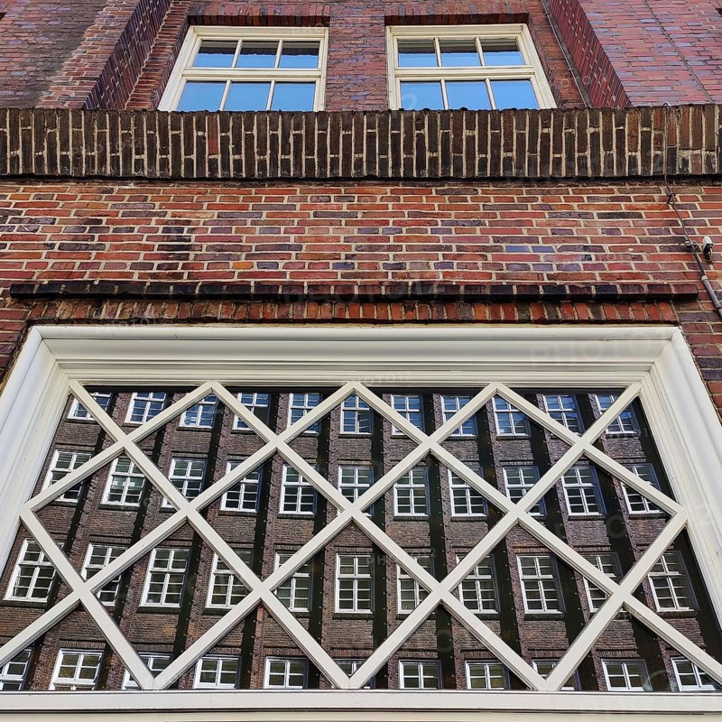 Reflection of the façade of the Sprinkenhof, Brick Expressionism, Kontorhausviertel, UNESCO World Heritage Site, Hamburg, Germany