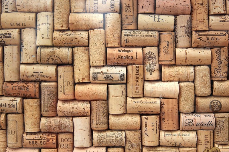 Corks from wine bottles laid as a regular pattern, wine corks, red wine