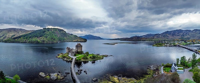 Panorama of Eilean Donan Castle and Loch Duich from a drone, Isle of Skye, Highlands, Scotland, England, United Kingdom