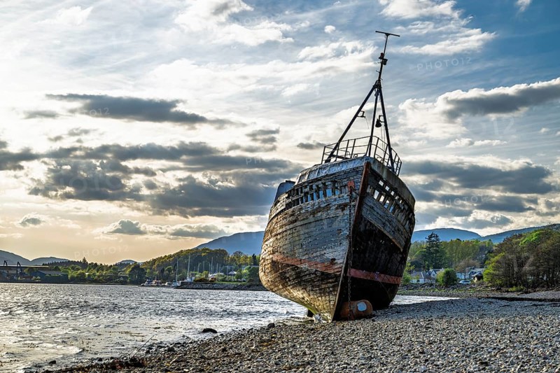 Corpach Wreck or Old Boat of Caol and Nevis Range Mountains, Caol Beach, Corpach, Fort William, Highland, Scotland, UK