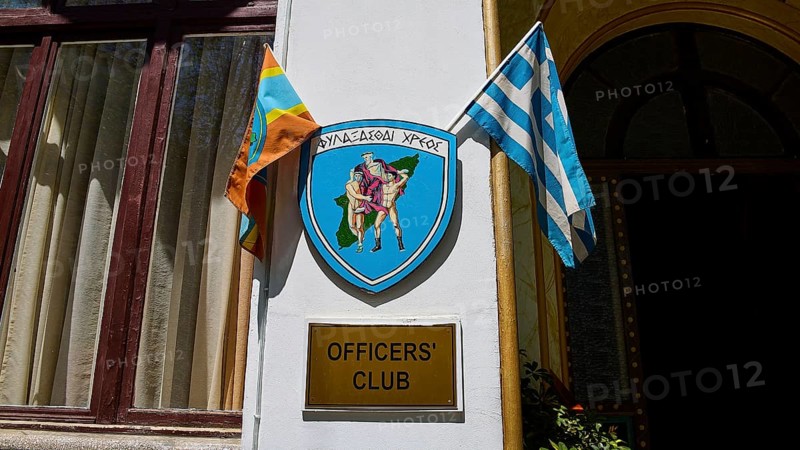 Building with sign of the officers' club, Greek flag and coat of arms, harbour area, Rhodes Town, Rhodes, Dodecanese, Greek Islands, Greece