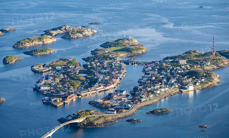 Houses on small rocky islands in the sea, view of Henningsvær, Vågan, Lofoten, Nordland, Norway