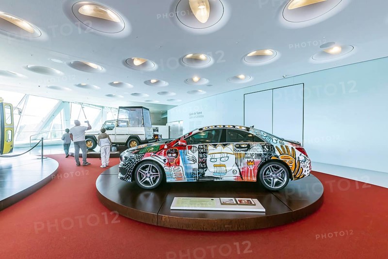 Mercedes-Benz CLA from 2015 - StreetStyle designed by rapper Cro. The Mercedes-Benz Museum in Stuttgart presents a journey through the automotive history of the global corporation. Collection 4, gallery of names. The history of the Mercedes star begins with the first automobile in 1886. 160 vehicles are on display. Stuttgart, Baden-Württemberg, Germany