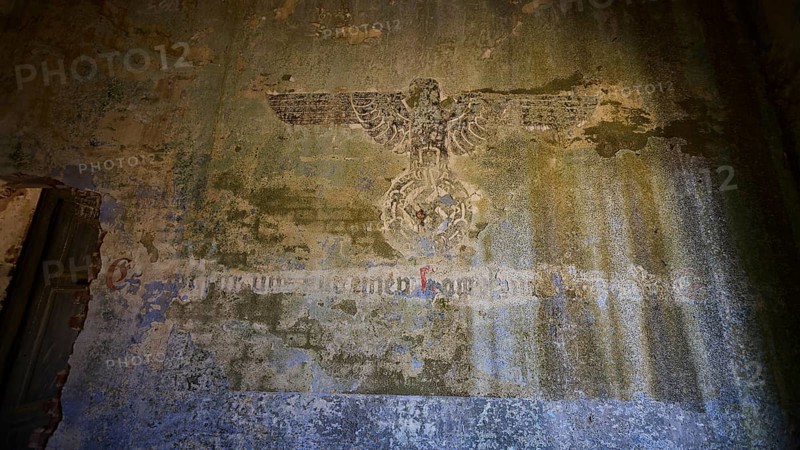 Lost Place, Former Nazi symbol on weathered wall in an abandoned building, Radio Station, WW2, Agios Nikolaos Radio, Agia Marina, Leros, Dodecanese, Greek Islands, Greece