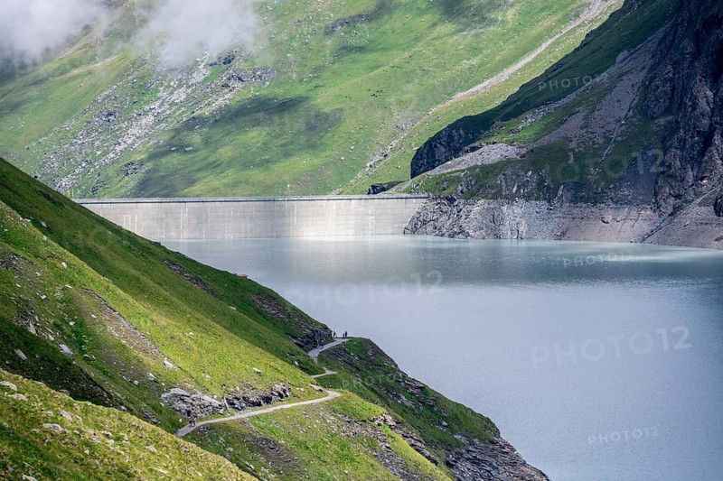 Hiking trail at the Lac des Dix reservoir with Grande-Dixence dam, Valais Alps, Valais, Switzerland