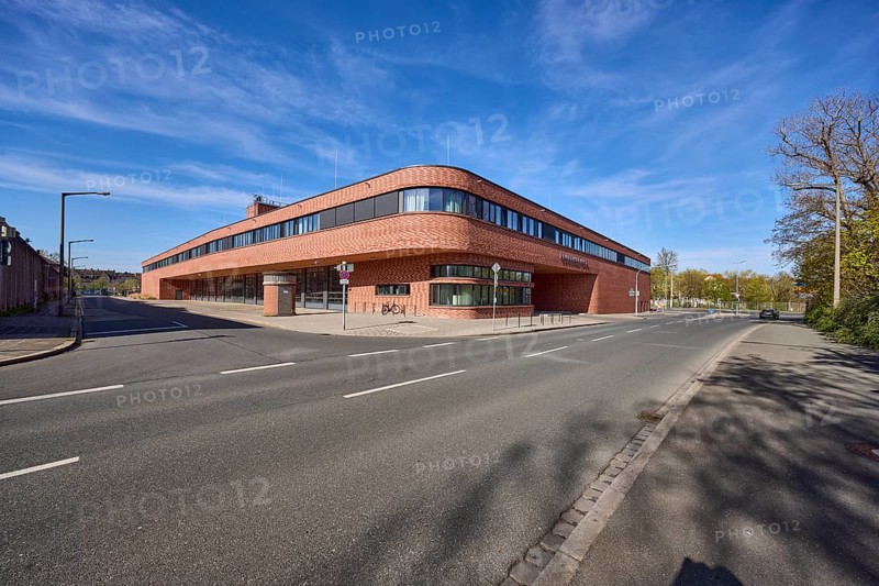 Fire station 1, modern architecture, driveway, street, lantern, trees, blue sky, cirrostratus clouds, intersection Reutersbrunnenstraße with Mannertstraße, Nuremberg, Middle Franconia, independent city, Bavaria, Germany