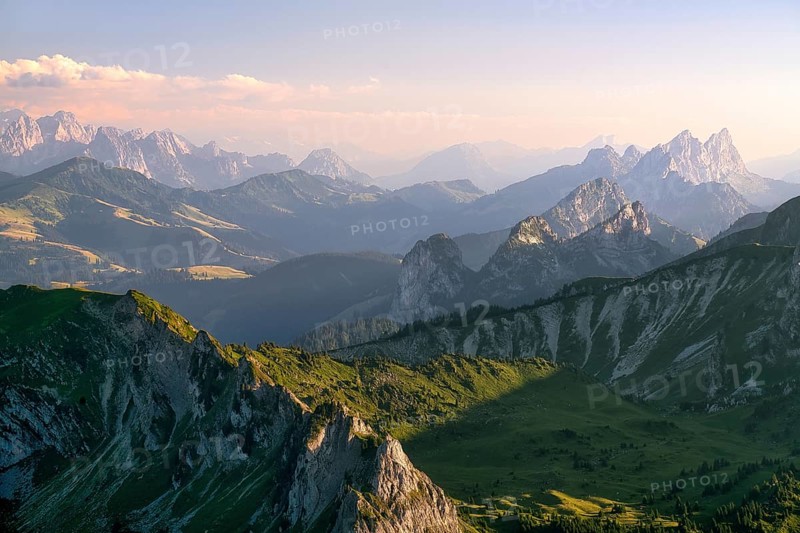 View from Mount Gantrisch, sunset over the Bernese and Fribourg Pre-Alps, Canton of Bern, Switzerland