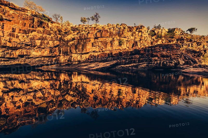 Bell Gorge waterfall, a body of water in north-west Australia in the Kimberley. Sunrise in the outback, Australia