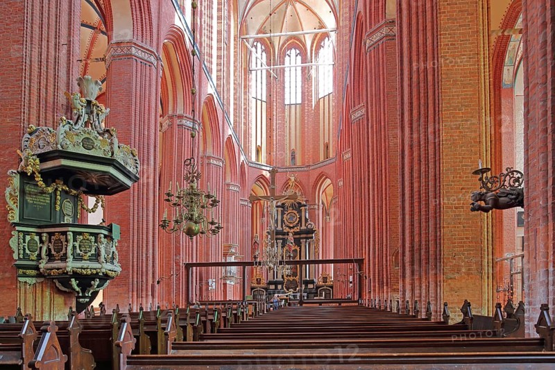 Interior view of the Gothic St. Nikolai Church with pulpit and pulpit bonnet, UNESCO, Brick Gothic, Brick church, Pulpit bonnet, Pulpit lid, Soundboard, Pulpit canopy, Pews, Wismar, Mecklenburg-Western Pomerania, Germany