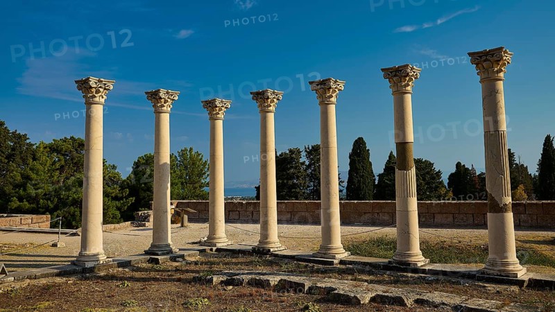 Six ancient columns with capitals in front of a clear sky, part of a historical site, Temple of Apollo, Corinthian Columns, Asklipion, Asklepieion, Healing Temple, Temple, Hippocrates, Kos, Dodecanese, Greek Islands, Greece