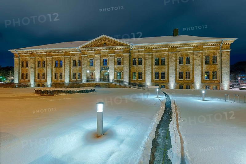 Historic military hospital illuminated winter snow Minden Germany