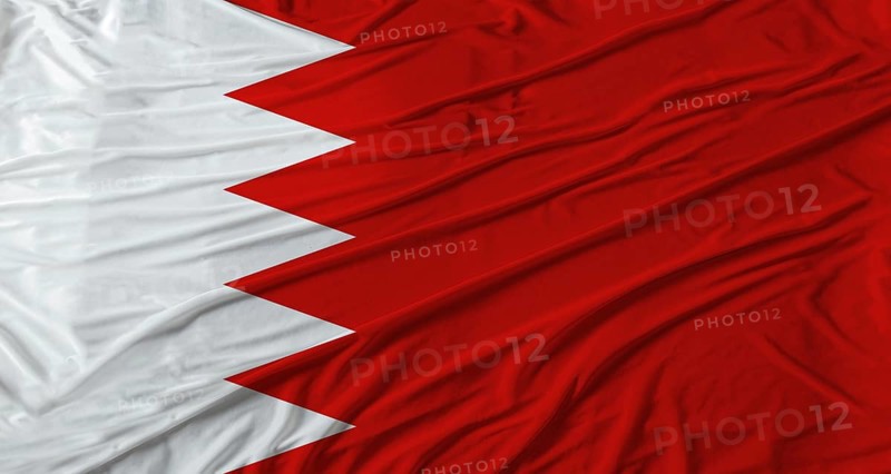 Close up of Bahrain flag waving. Flag of Bahrain with cloth texture