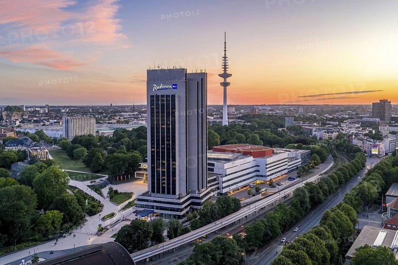 Aerial view of the CCH and Radisson Blue Hotel with television tower Heinrich-Hertz-Turm (Telemichel) at Dammtor at sunset, Hamburg, Germany