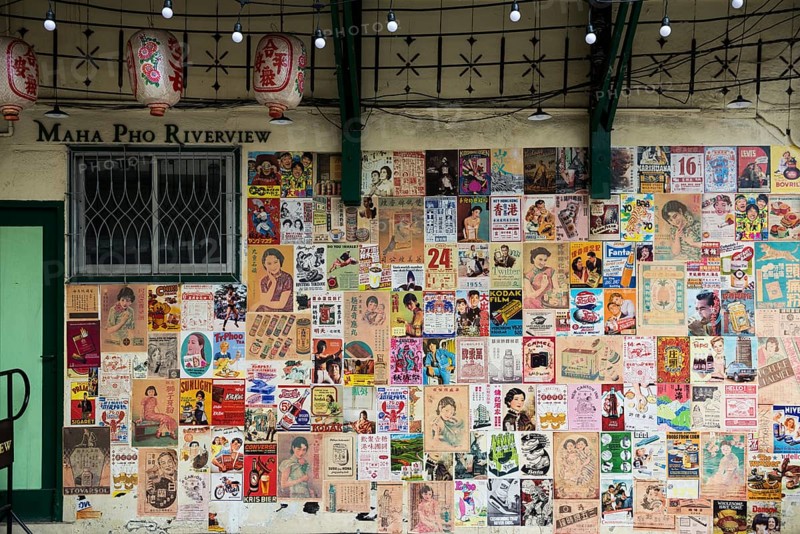 House wall with old posters and advertising, Chinatown, Bangkok, Thailand