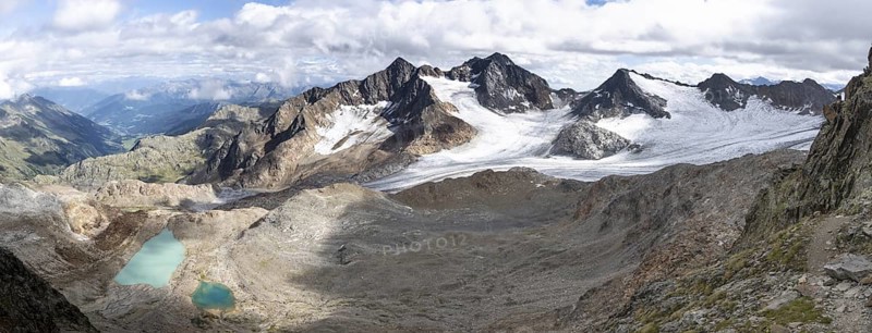 Panorama from the summit of the Becher, high mountain landscape, view of mountain peaks Königshofspitz and Schwarzwandspitz with glacier of the Übeltalferner, view of the Ridnaun valley, Stubai Alps, South Tyrol, Italy