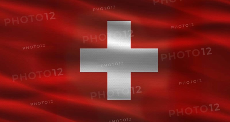 Switzerland flag with fabric texture. Realistic flag of Switzerland waving