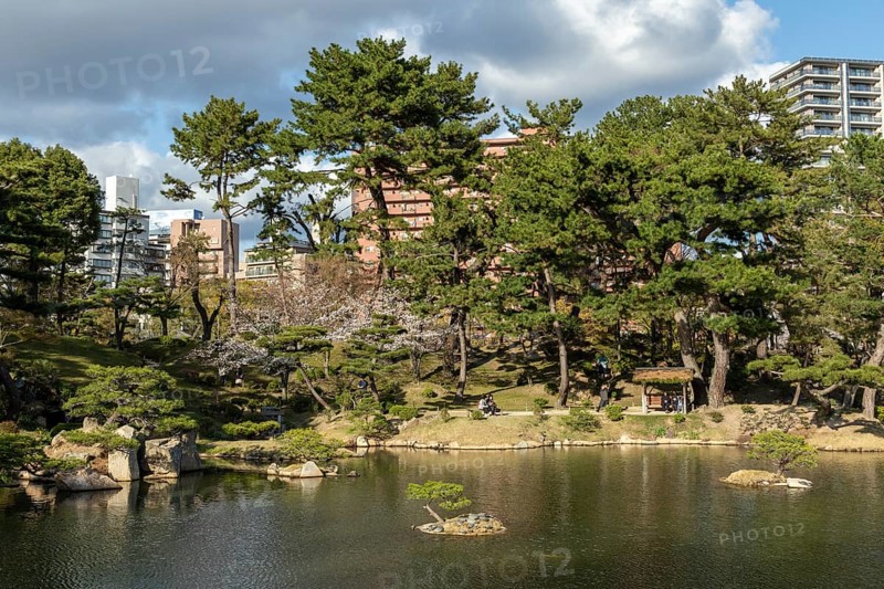 Shukkei-en with Sekisui-gan stone formation and Takuei-chi pond in spring, historical Japanese strolling garden, Japanese garden, green area, tourist attraction, sight, Naka-ku, Hiroshima, Japan