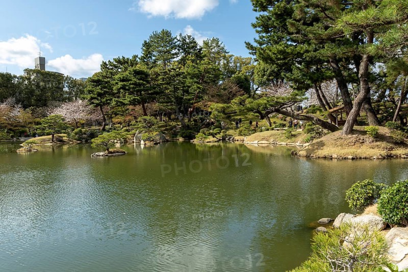 Shukkei-en with Sekisui-gan stone formation and Takuei-chi pond in spring, historical Japanese strolling garden, Japanese garden, green area, tourist attraction, sight, Naka-ku, Hiroshima, Japan