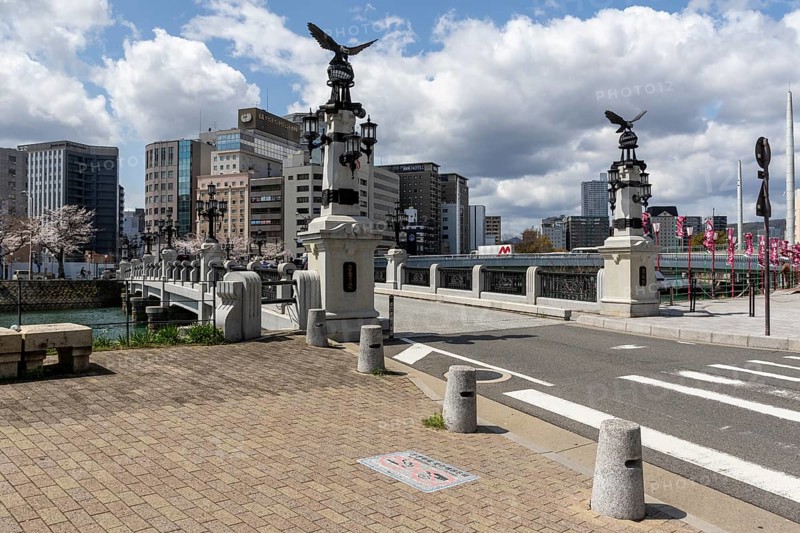 Tourist attraction, place of interest, historic Enkobashi stone bridge over the Enko River with eagle figures, Enko-bashi Bridge, built in 1926, restored in 2016 for the 70th anniversary of the atomic bombing, Enkobashicho, Minami Ward, Hiroshima, Japan