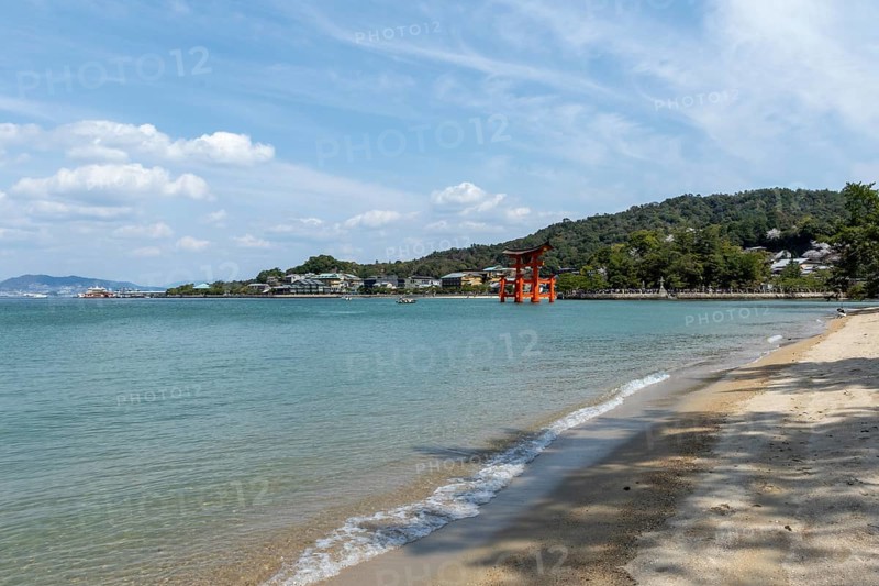 Beach with surf and torii in the water, sight, tourist attraction, UNESCO World Heritage Site, Itsukushima Shrine, Miyajima Island, Hatsukaichi, Hiroshima Prefecture, Japan
