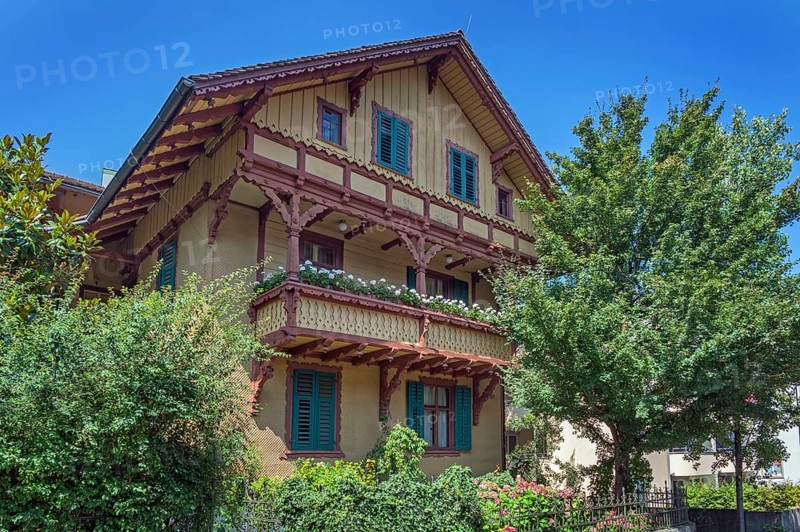 Ochre yellow wooden barrel, Villa Auf der Flur with large balcony around 1900, Dornbirn, Vorarlberg, Austria