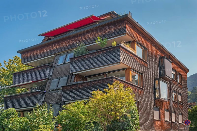 Modern house with wooden shingle façade, large green balcony, Dornbirn, Vorarlberg, Austria