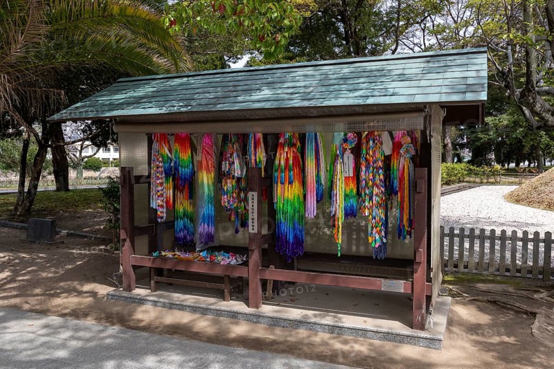 Colourful origami cranes made of paper as a sign of peace in the Peace Park, landmark, UNESCO World Heritage Site, peace monument and memorial to the victims of the atomic bombing of Hiroshima, Naka Ward, Hiroshima, Japan