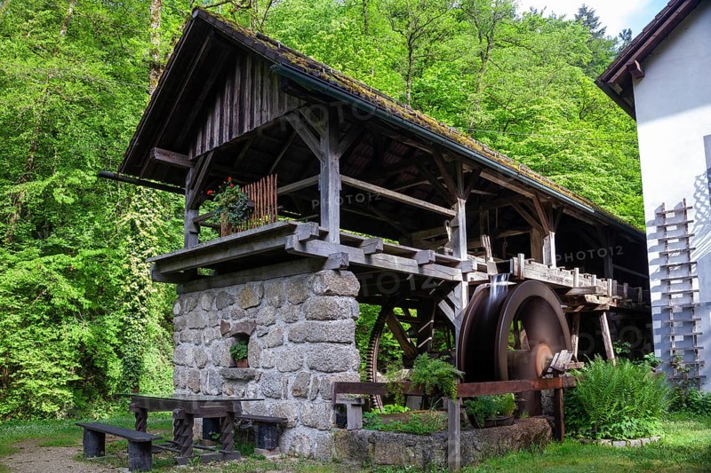 Rustic old mill in the countryside, surrounded by trees and wooden architecture, Stillensteinklamm Upper Austria Austria